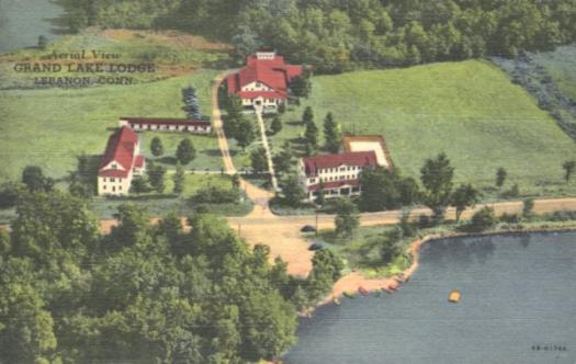 aerial shot of buildings in a large field